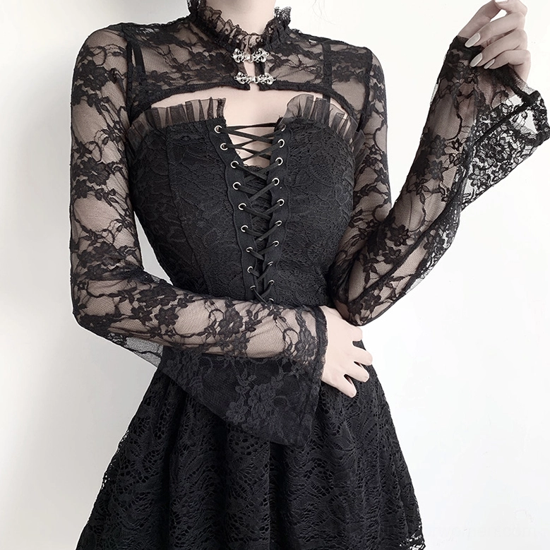 Black gothic lace crop top with lace-up corset bodice detail and bell sleeve on model, side front view