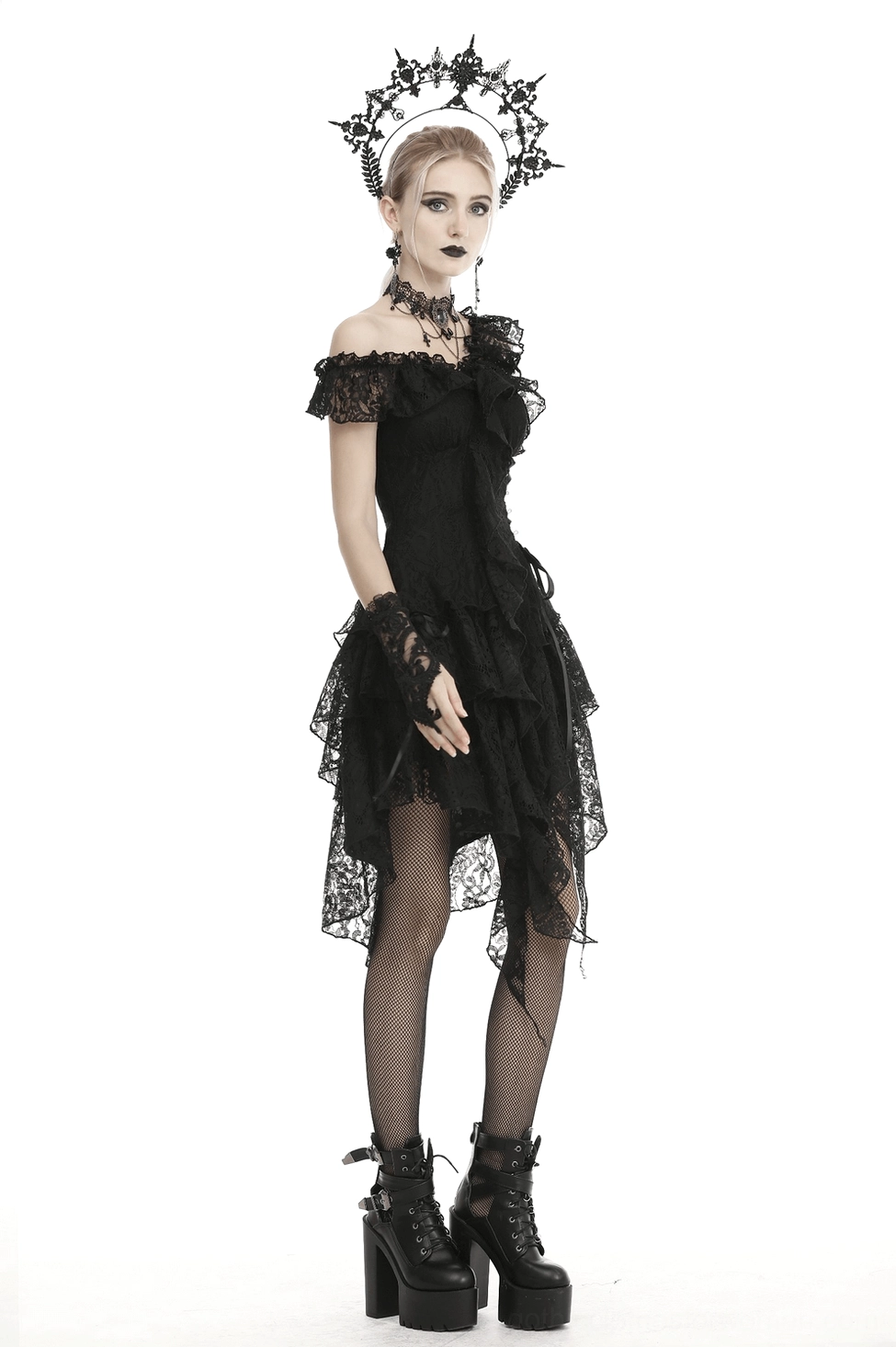 Detail shot of black lace gothic dress off-shoulder ruffle and asymmetric layering