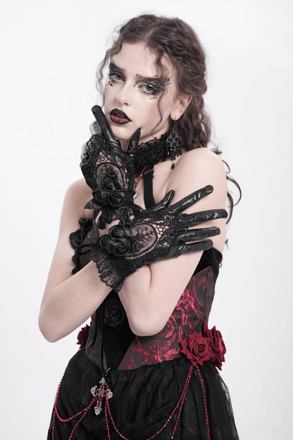 Black lace gothic gloves with ruffle cuff detail and satin rose embellishments