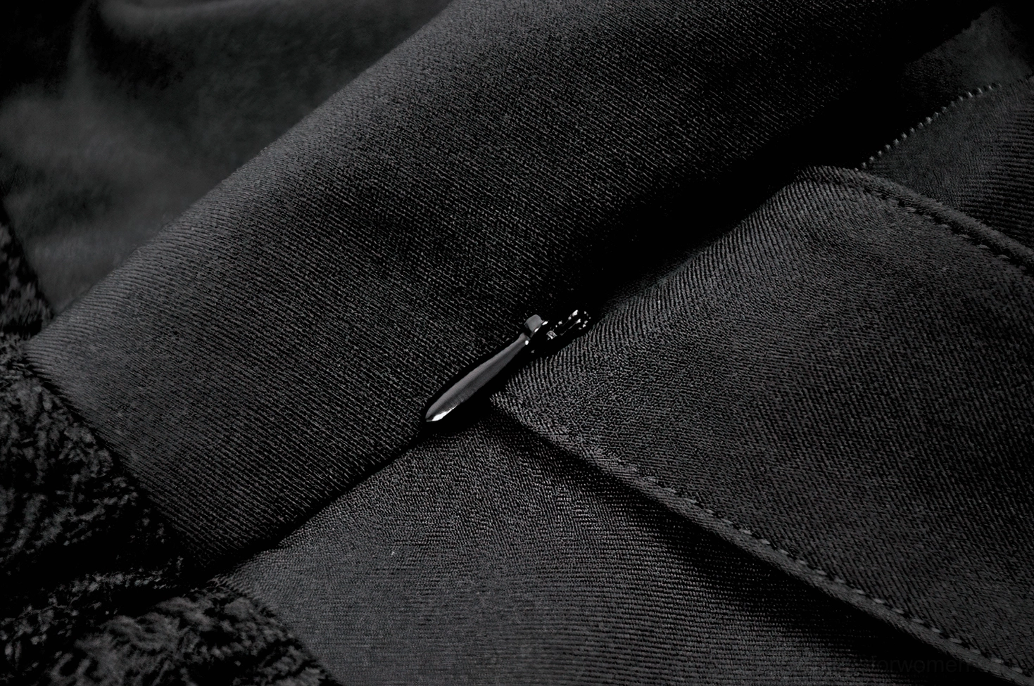 Black lace gothic mini skirt - product construction detail and hardware focus