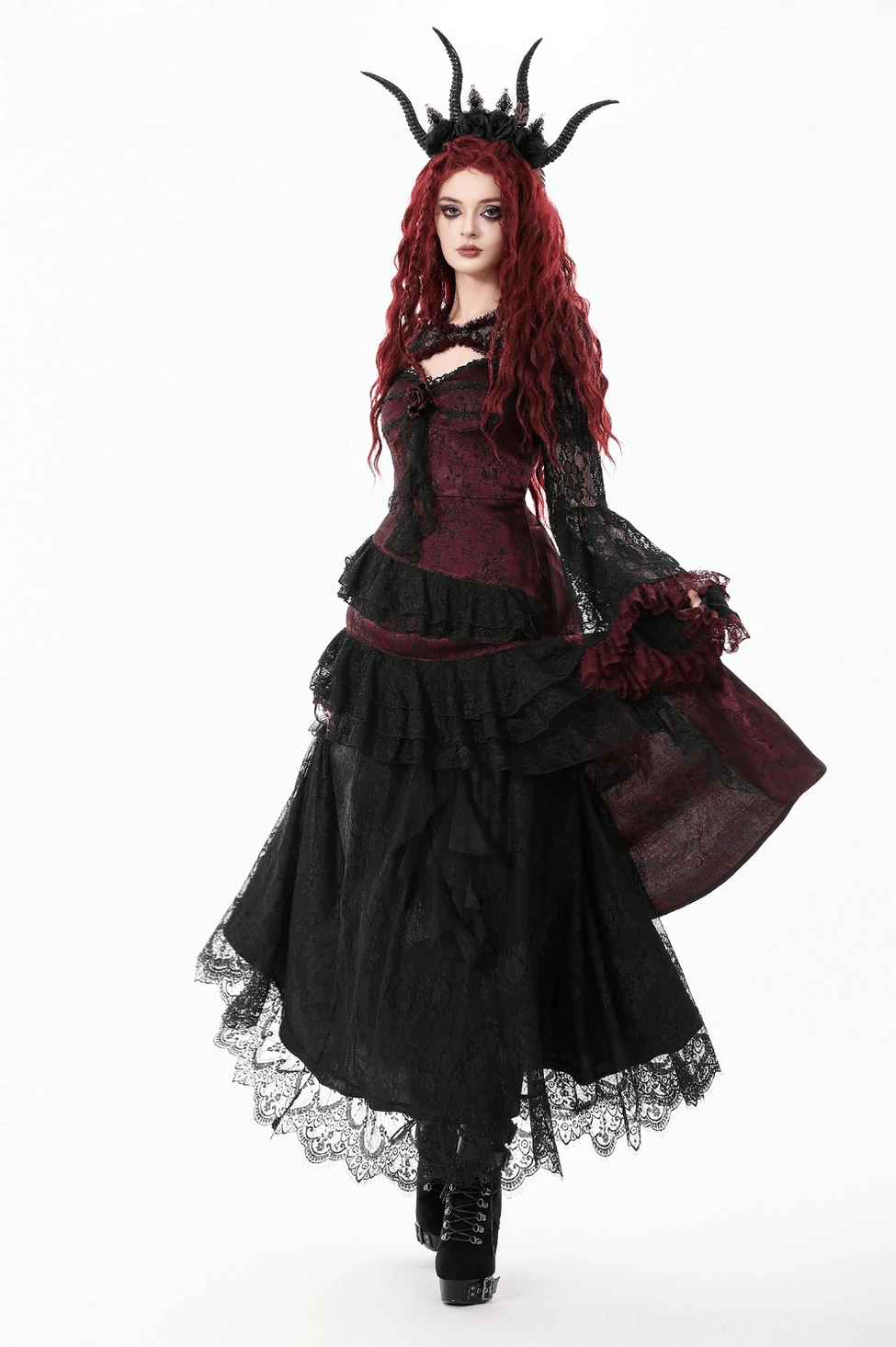 Black lace shrug layered over outfit, showing how the gothic cape piece works with other garments