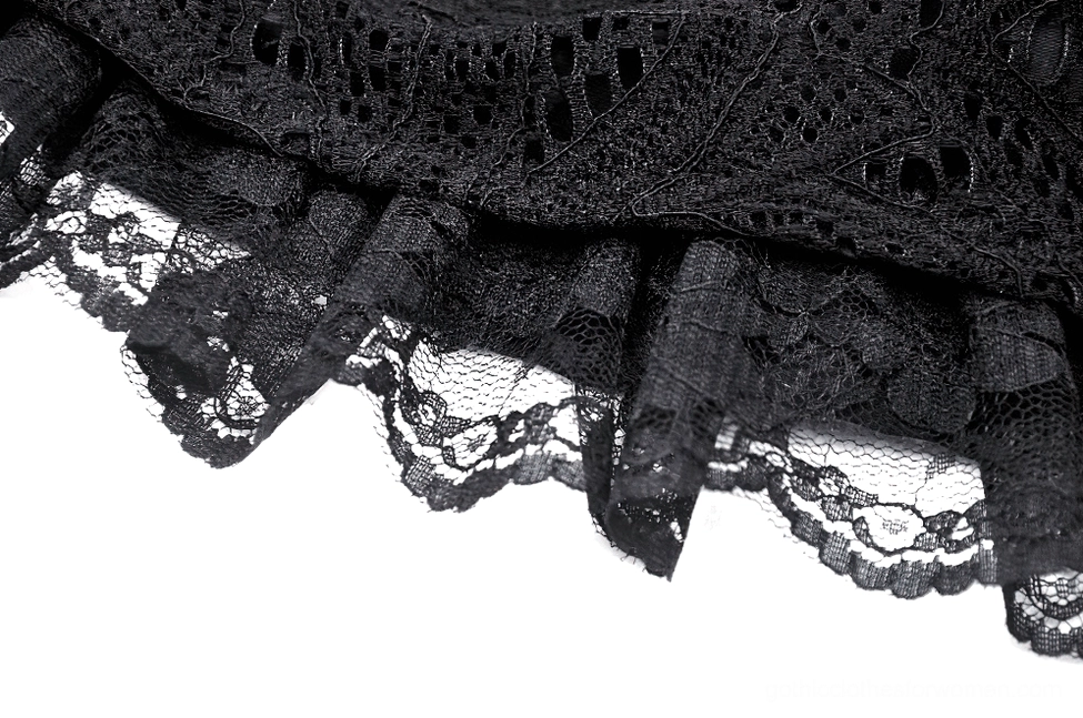 Black floral lace hem with layered ruffled trim close-up detail of gothic lace skirt