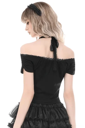 Back view of black gothic crop top showing lace halter neck tie and off-shoulder sleeves with scalloped lace trim