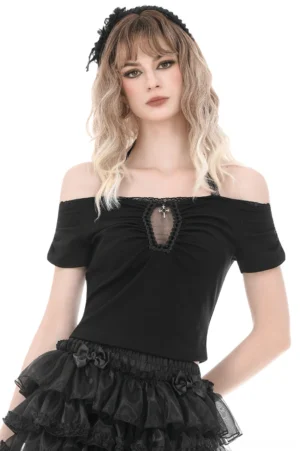 Black gothic off-shoulder halter crop top with lace trim and cross charm, worn by blonde model with matching ruffle skirt on white studio background