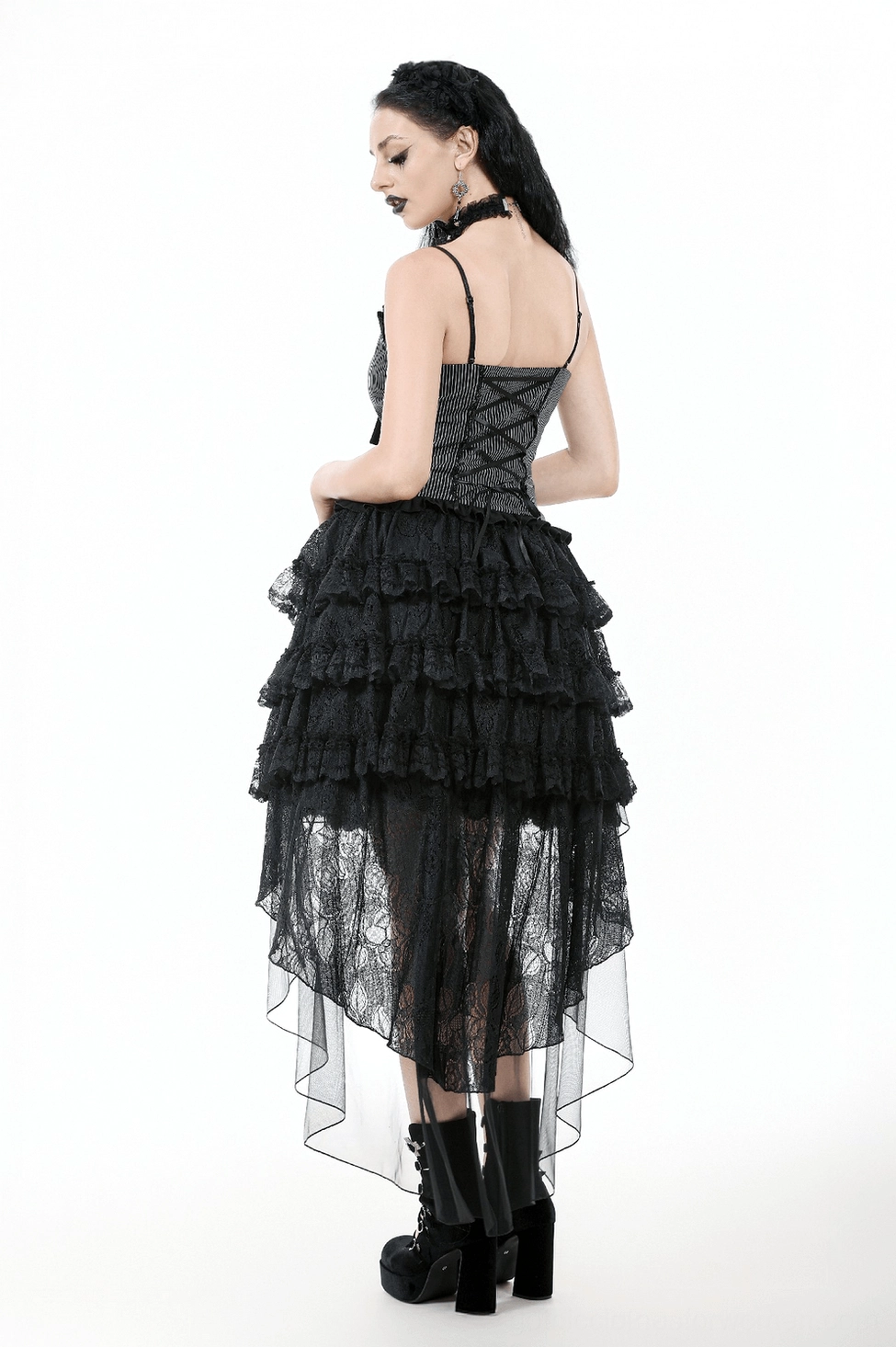 Black high-low lace ruffle skirt back hem view revealing tiered construction and layers