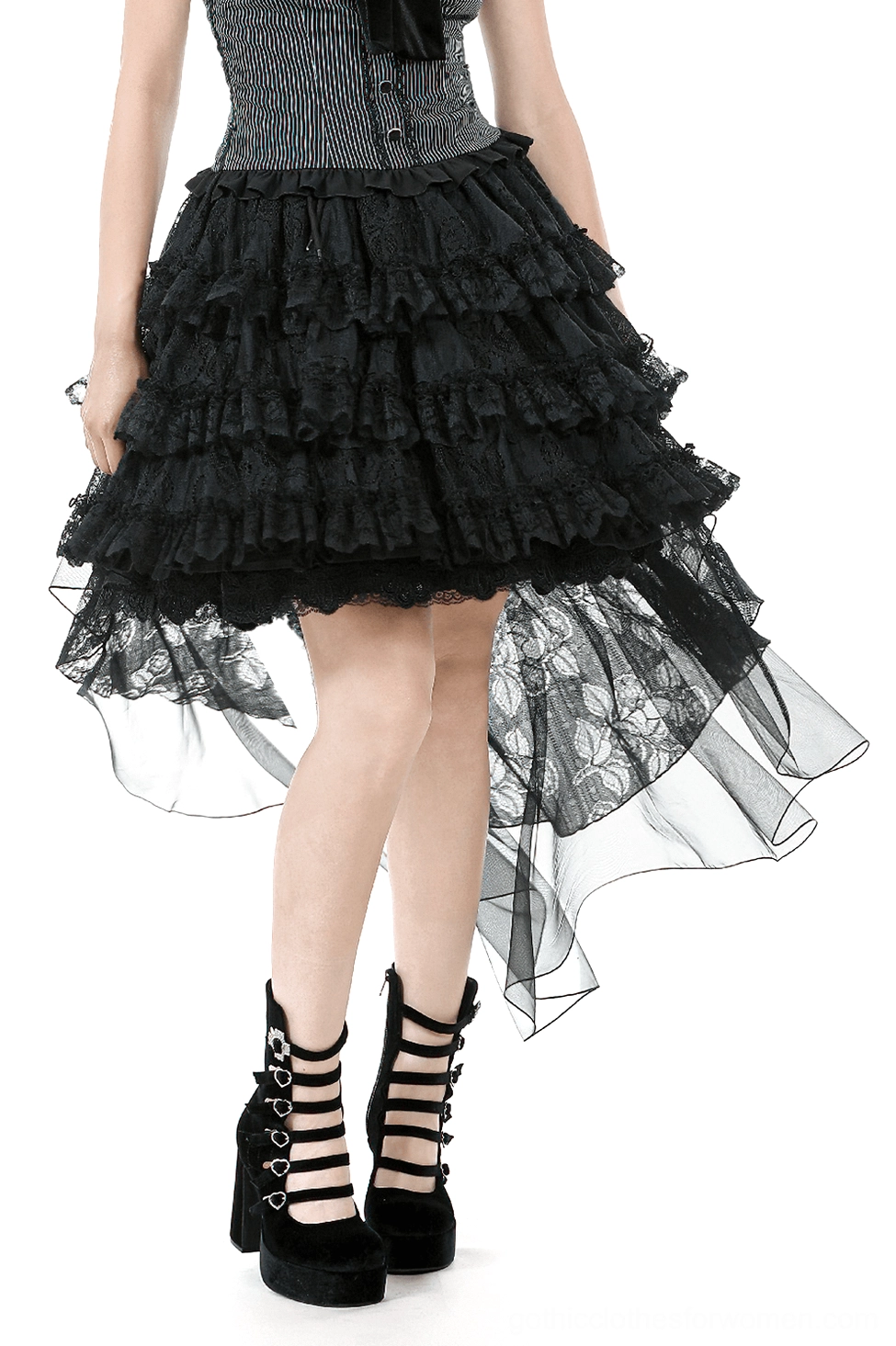 Black gothic high-low ruffle skirt worn by model with corset and platform boots, front three-quarter view