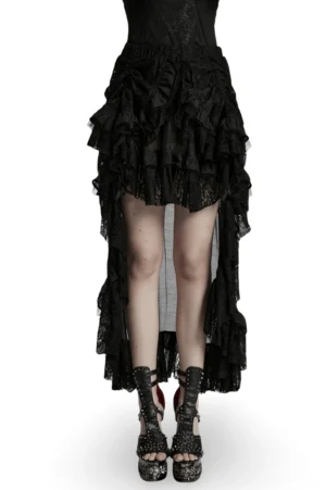 Black asymmetrical lace high-low skirt with ruffled chiffon mesh worn by model, front lower-body view showing dramatic high-low hemline