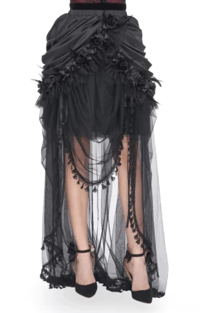Black lace maxi skirt with ruched satin waist and sheer tulle overlay worn by model, front view showing high-low hemline and lace trim details