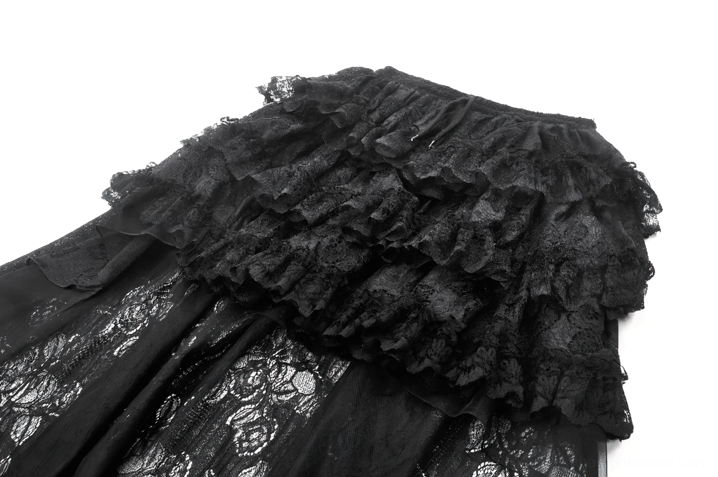 Close-up angled view of black lace ruffle skirt layers with floral lace fabric detail