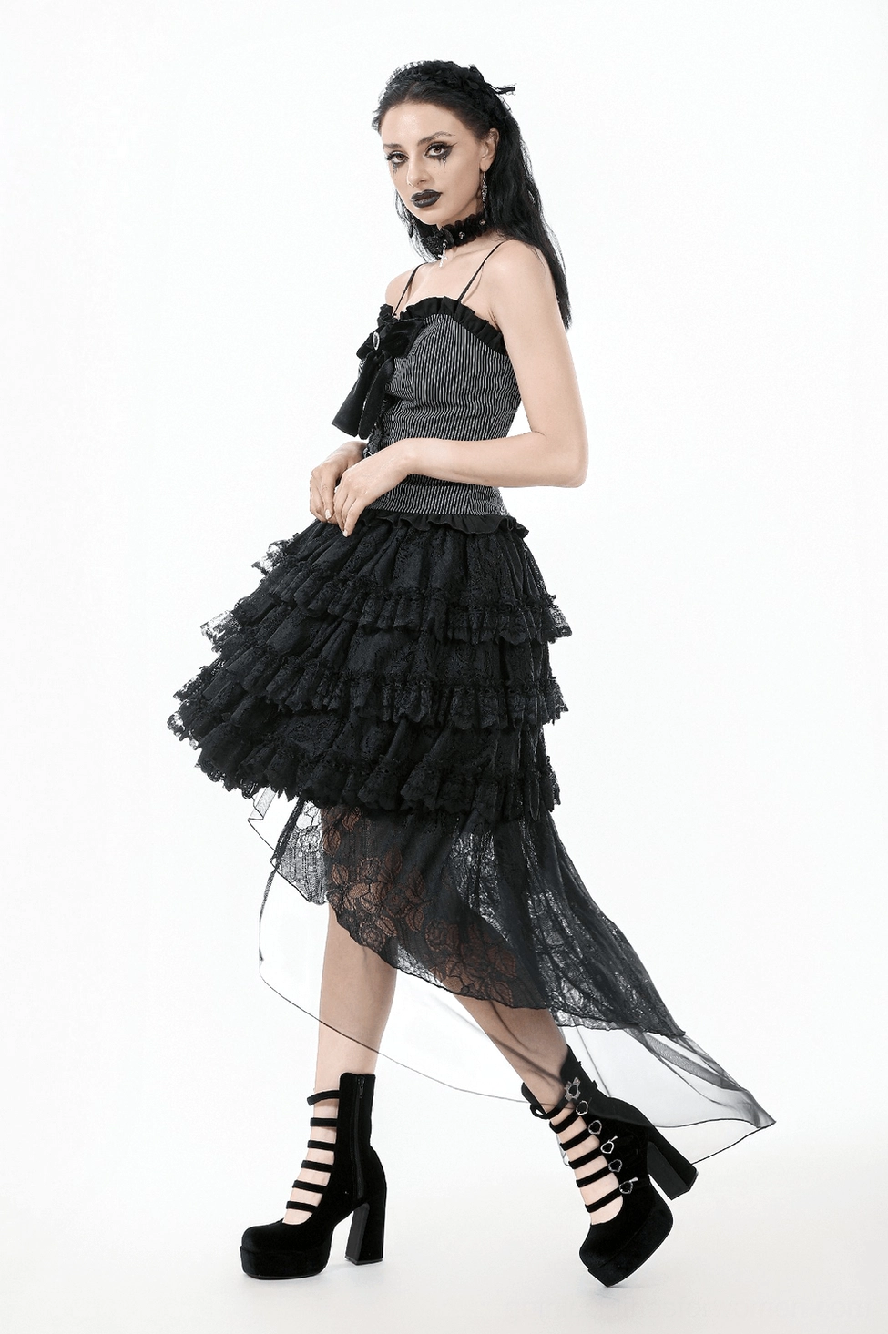 Black lace ruffle skirt detail showing sheer tulle overlay and intricate lace pattern