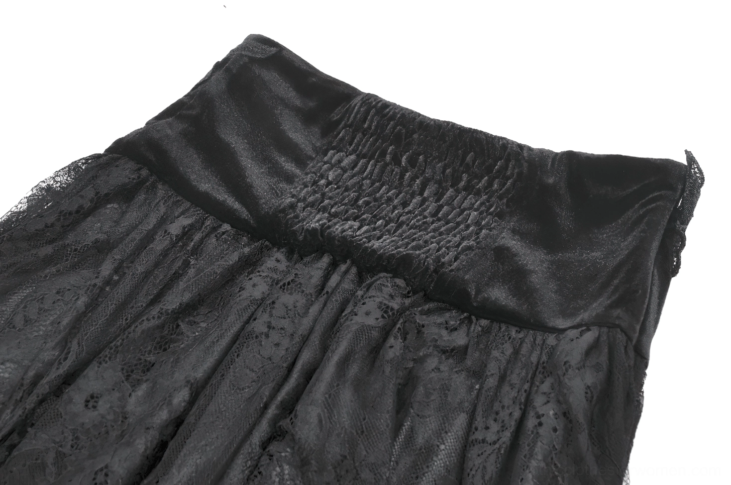Close-up side view of black lace maxi skirt smocked waist area showing shirred satin waistband and layered lace fabric texture