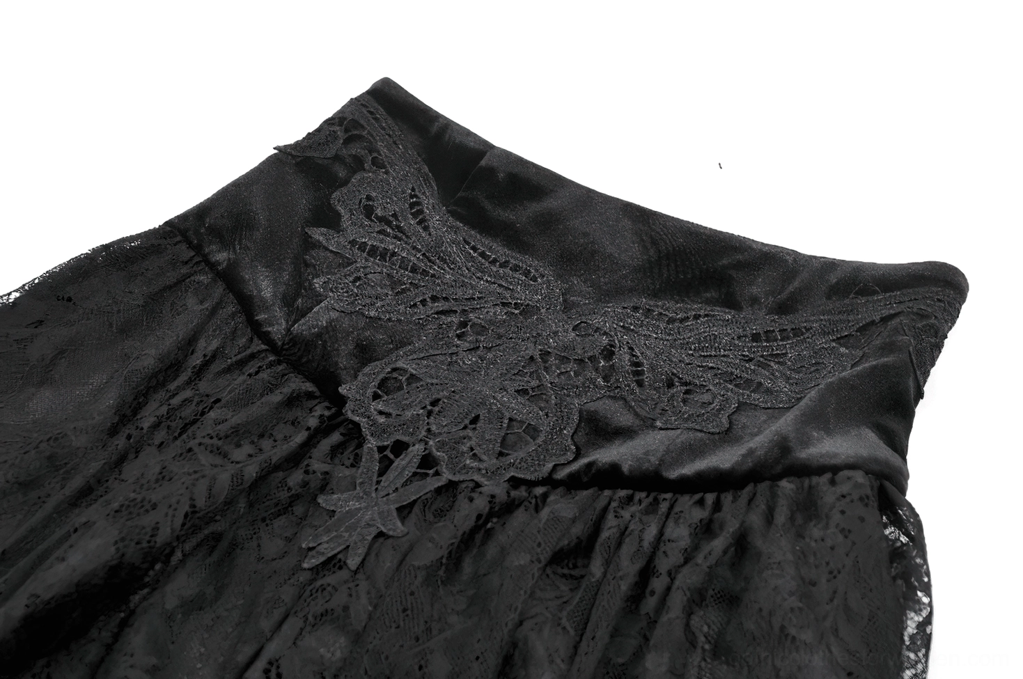 Close-up detail shot of black gothic skirt waist featuring satin waistband with butterfly lace appliqué embroidery