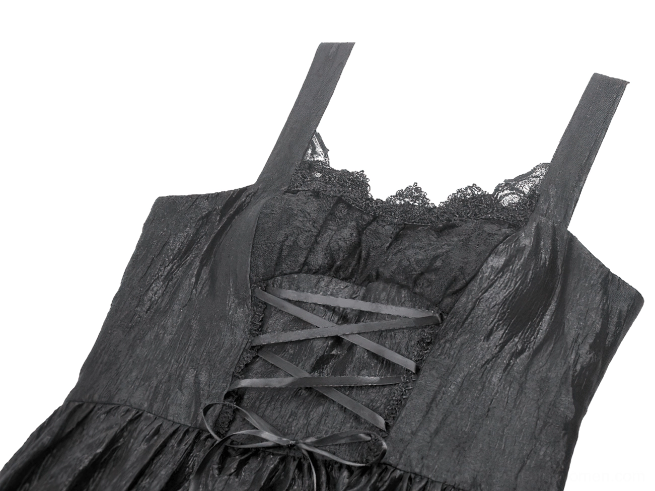 Black lace slip dress detail shot showcasing intricate lace trim, ruffled hem, and lace strap construction