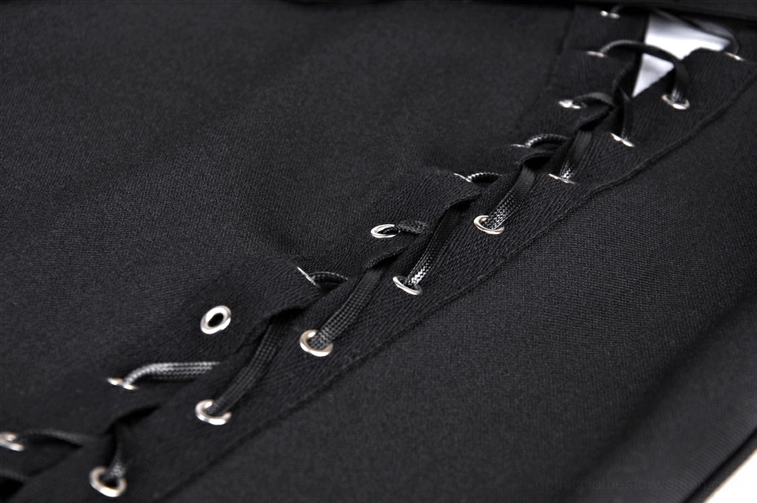 Close-up detail of metal eyelet lace-up trim featuring silver eyelets and black fabric weave of gothic maxi skirt