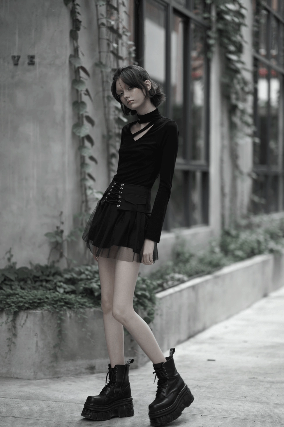 Black lace-up gothic skirt model presentation showing silhouette fit and mesh tulle hem transparency