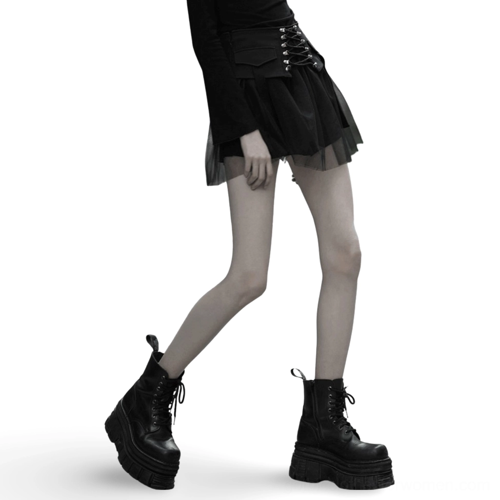 Black lace-up gothic mini skirt front view on model with sheer mesh tulle hem and structured waistband