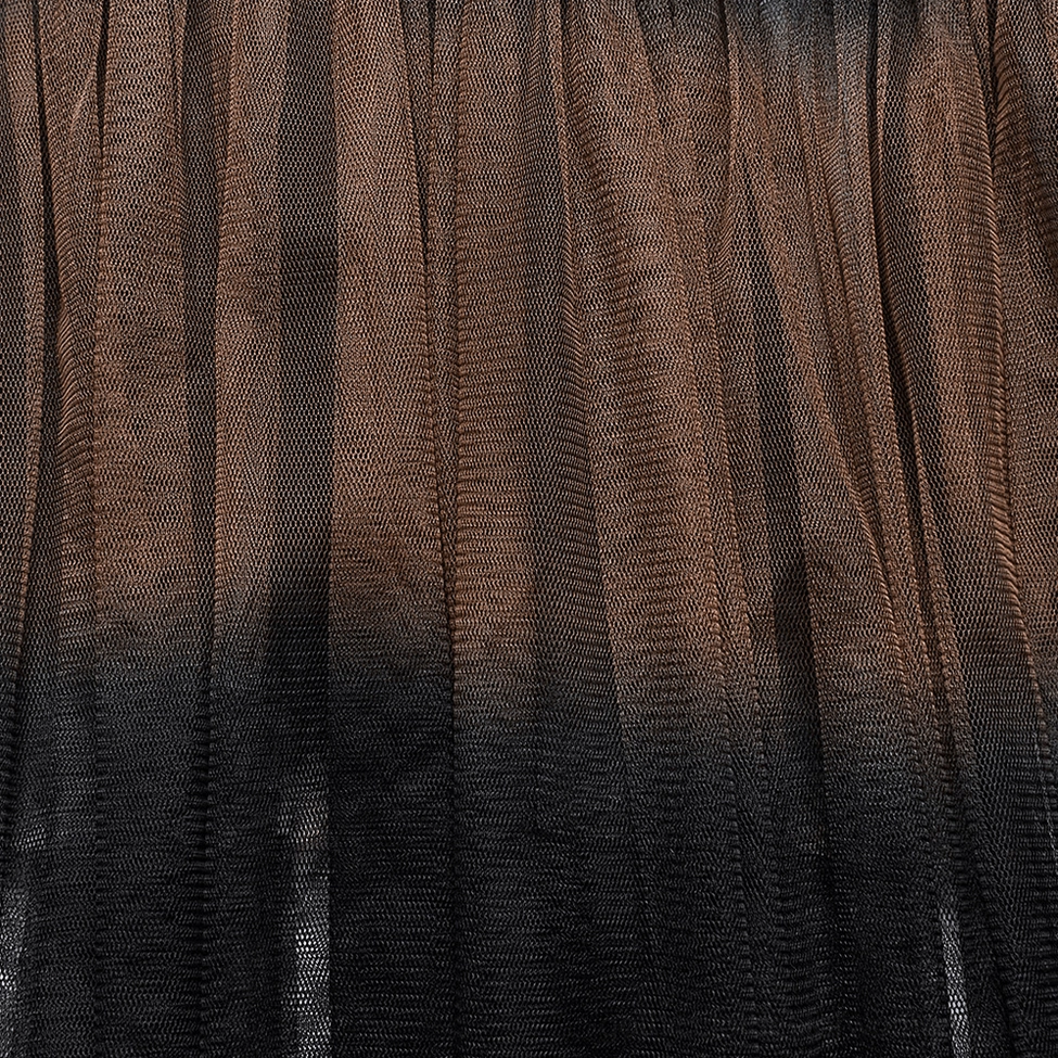 Black layered mesh skirt fabric close-up, showing cascading tulle layers and multi-tiered ruffle construction with ombre brown-black gradient effect