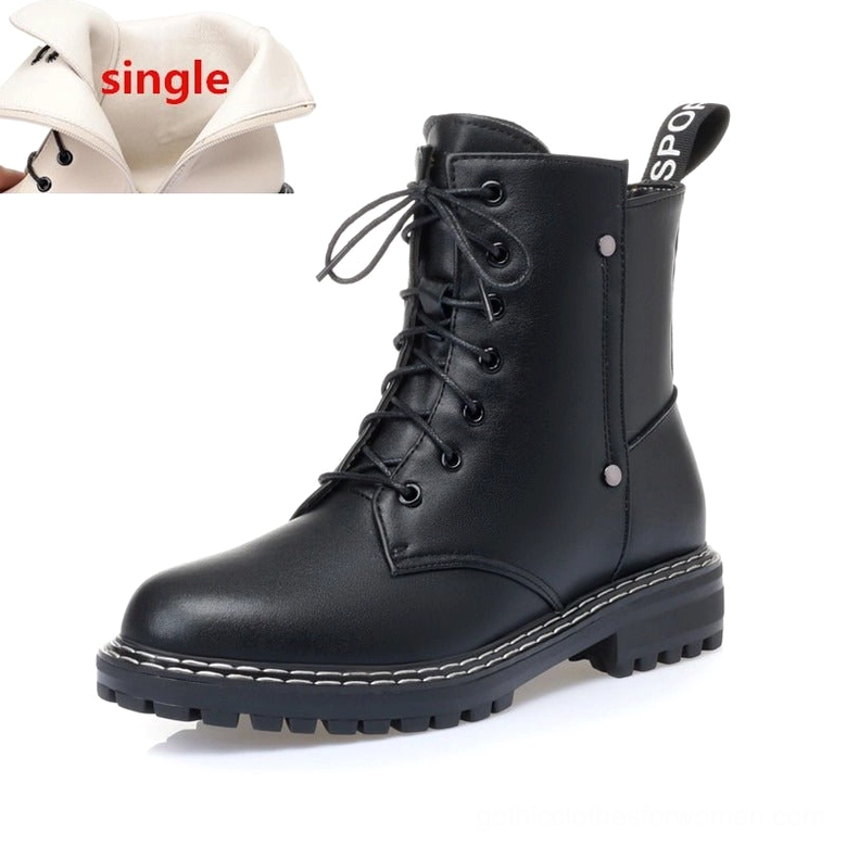 Black leather combat ankle boot three-quarter frontal view with dual lace-up and side zipper