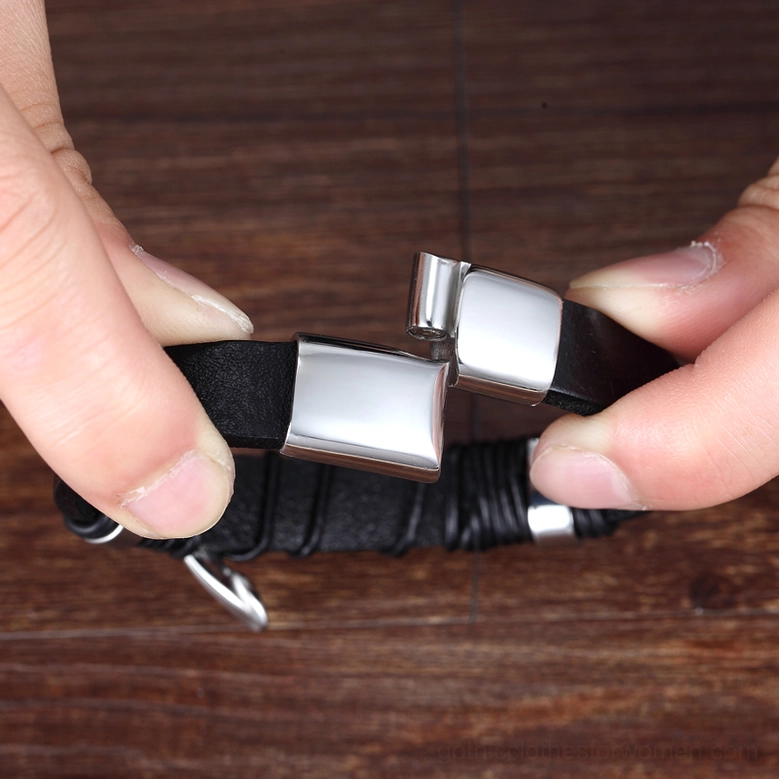 Black leather gothic bracelet with stainless steel feather charm, product lifestyle photography