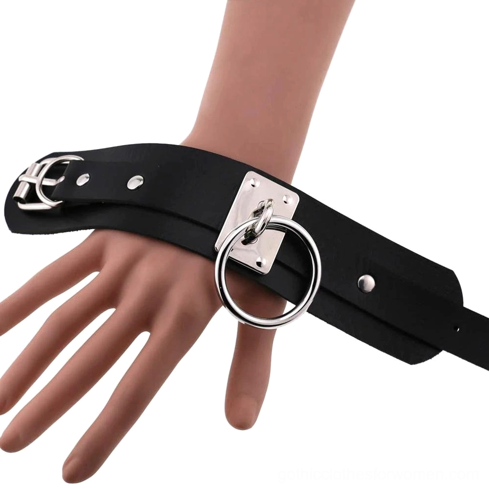 Multiple black leather gothic cuff bracelets displayed, showing double-layer design and versatility