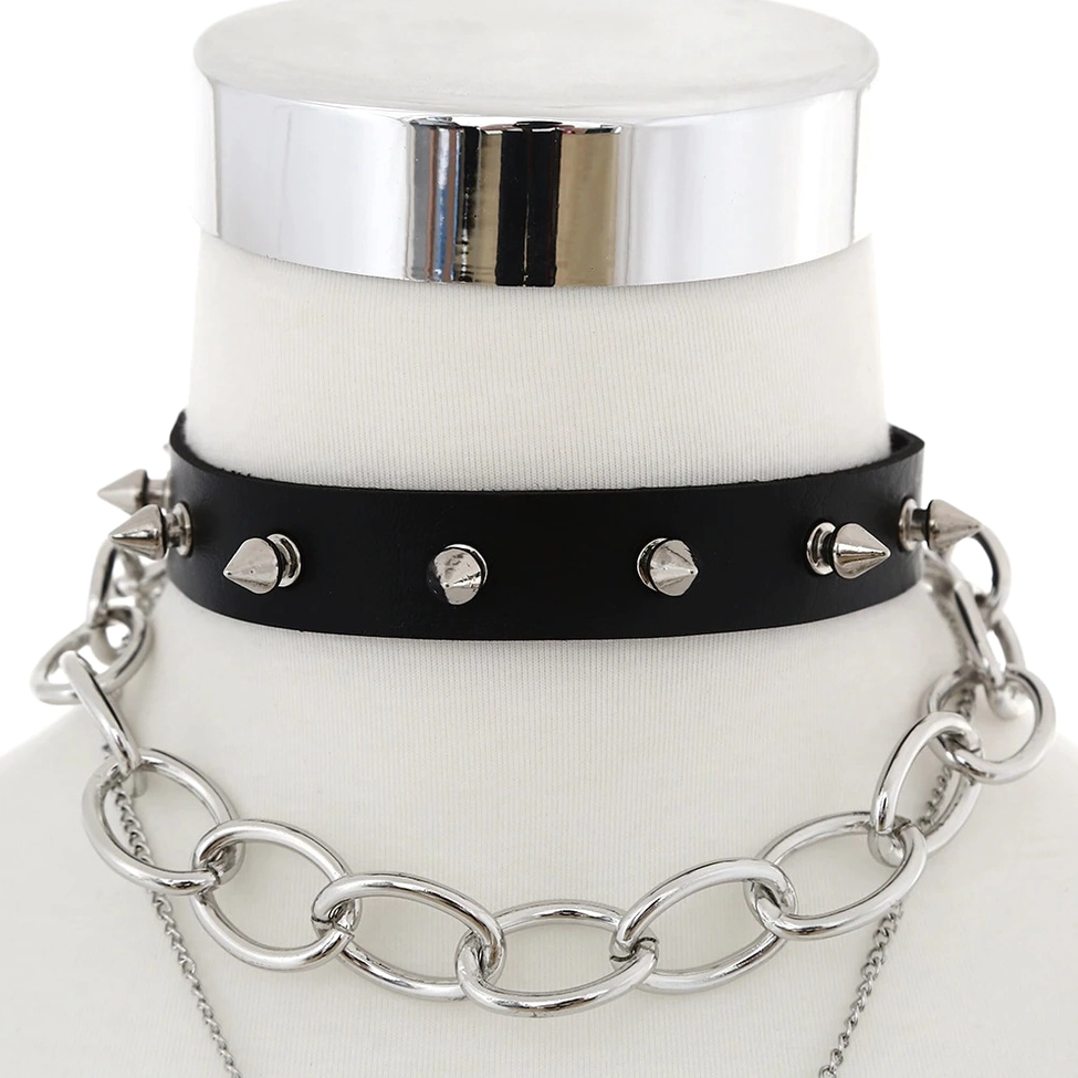 Front close-up of black studded leather gothic choker showing detailed silver spike studs and metal chain construction