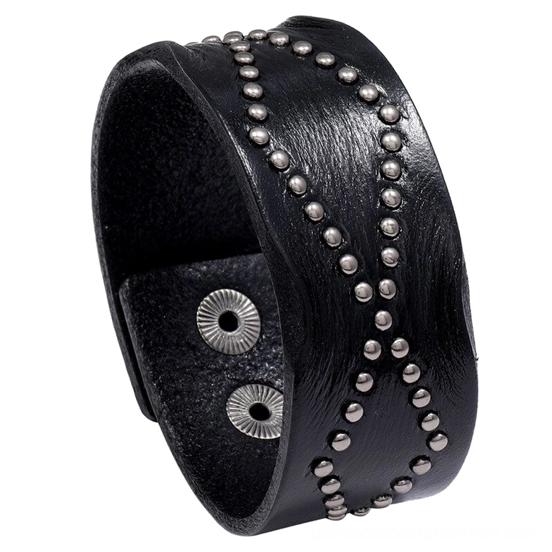Black leather gothic cuff bracelet with cross rivet pattern and snap buckle closure, front oblique view on white background