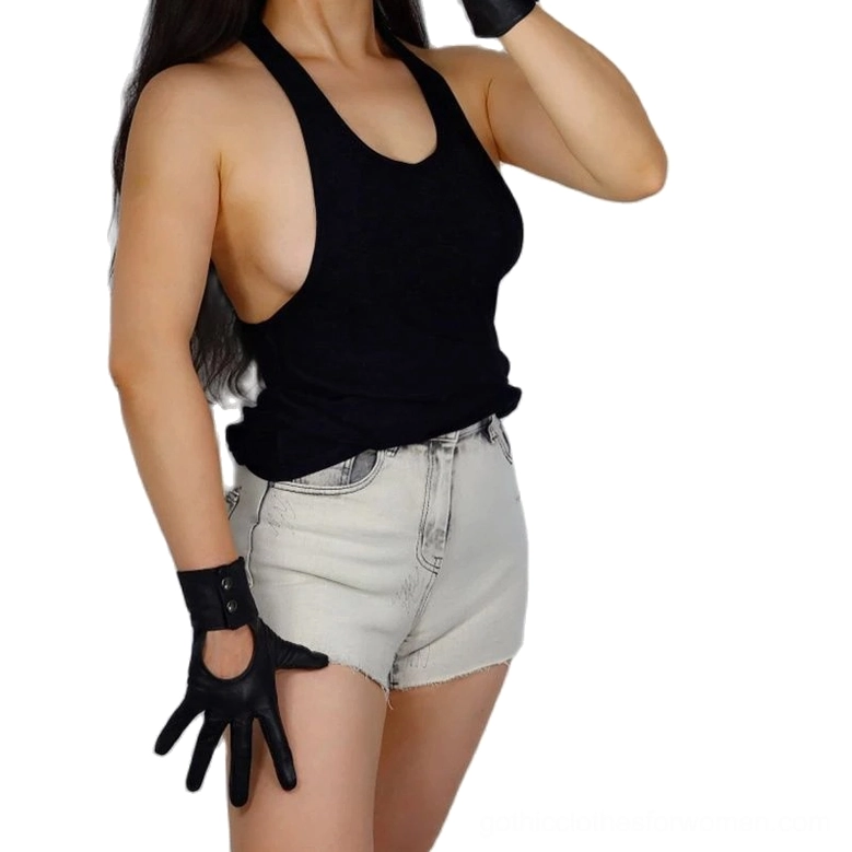 Black leather gothic gloves with palm cutout and buttoned cuff worn on both hands, complete styling shot with alternative fashion aesthetic