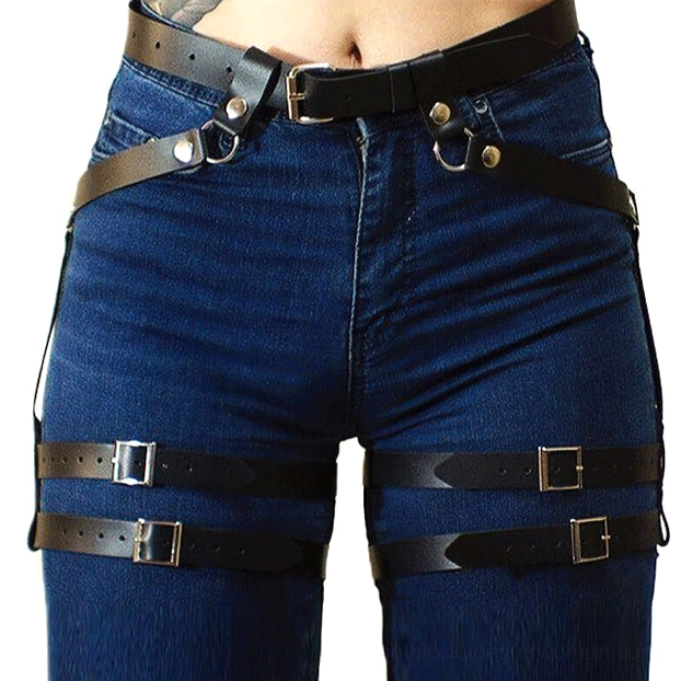 Black faux leather body harness close-up front view showing metal buckle rivets and adjustable strap system