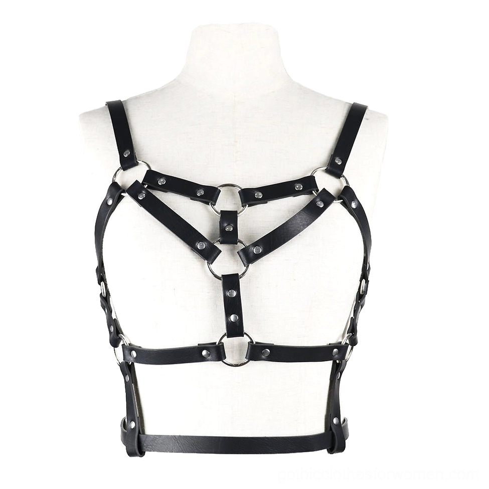 Black PU leather body harness displayed on mannequin front view with crisscross shoulder straps and O-ring hardware
