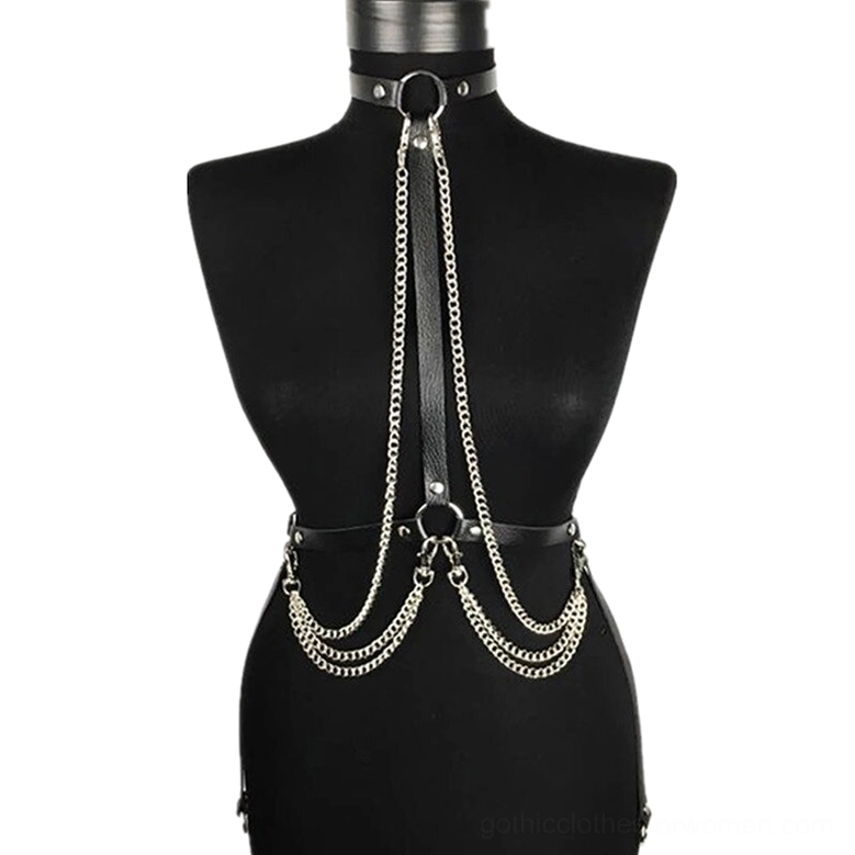 Black PU leather body harness displayed on mannequin showing layered silver chains and D-ring hardware details
