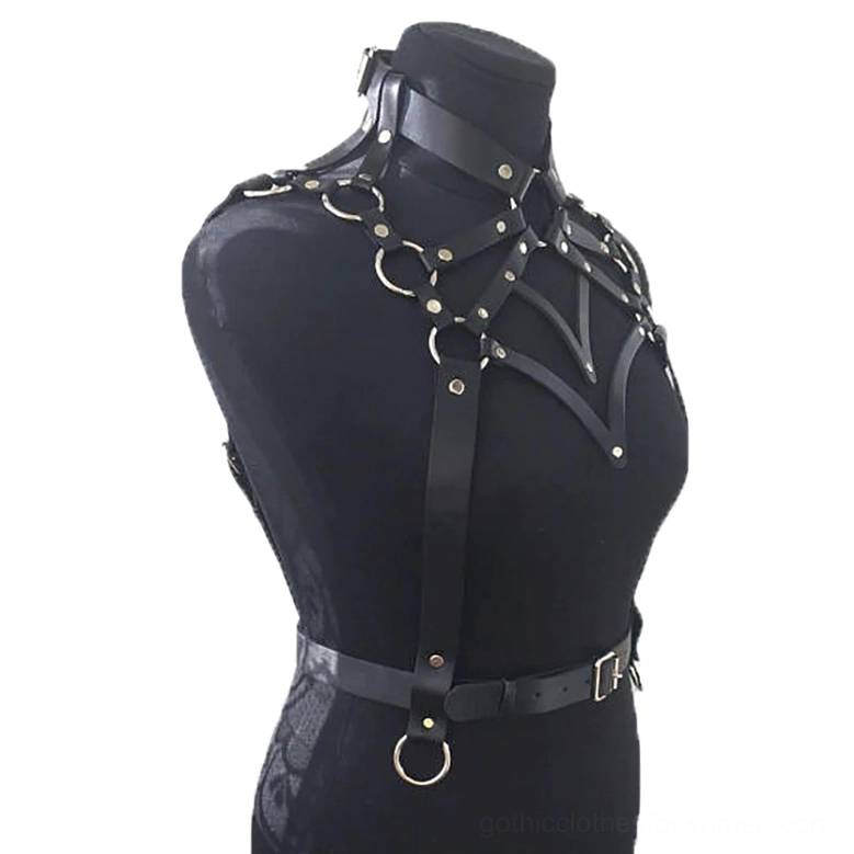 Black leather body harness side view - showing shoulder strap and decorative D-ring hanging detail on mannequin