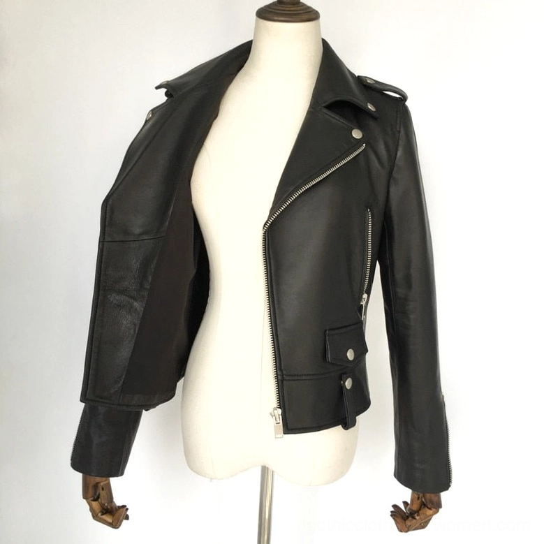 Women's black sheepskin leather motorcycle jacket open front view, revealing polyester lining, snap waist tabs, and zipper construction details