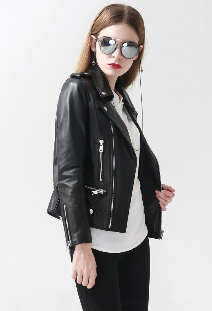 Women's black leather gothic motorcycle jacket worn view, showing how the standing collar and asymmetrical zipper create dramatic silhouette