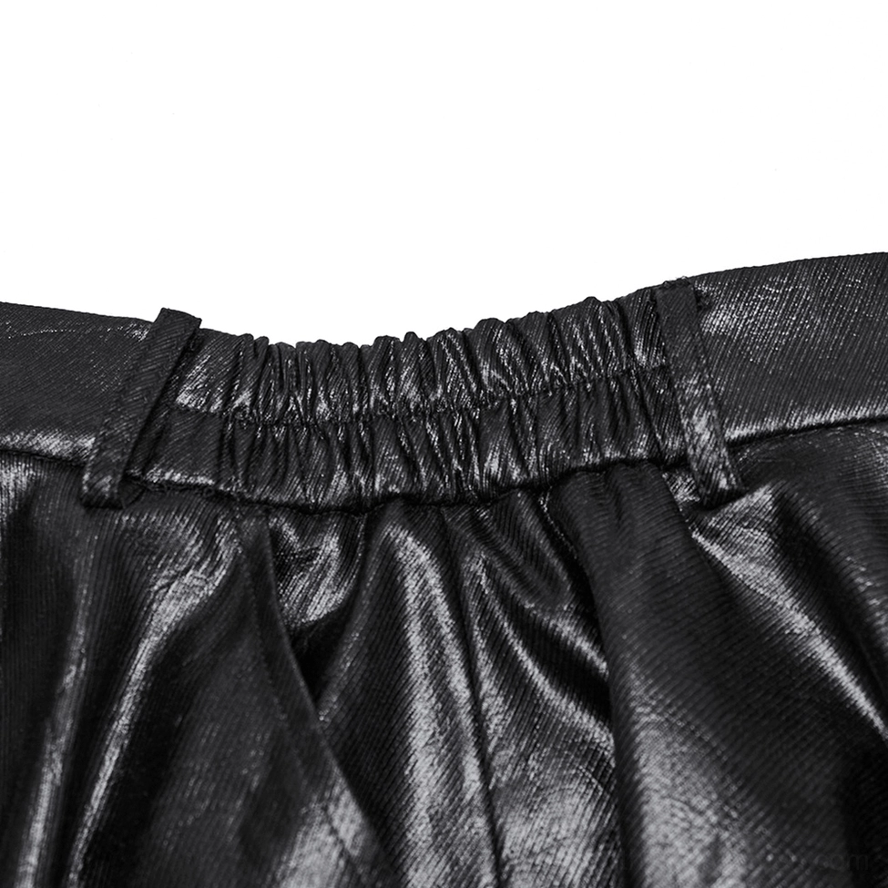 Close-up side view of elasticated waist and belt loops on black faux leather skirt