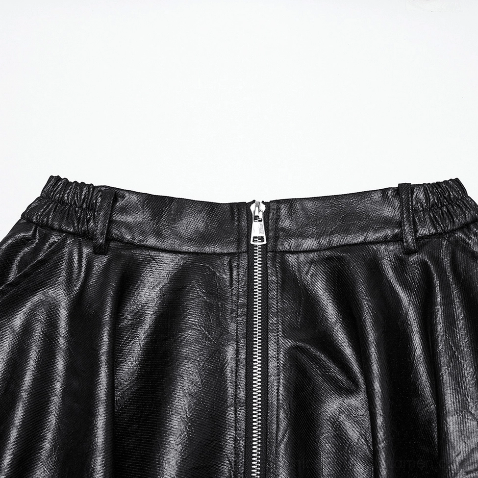 Close-up detail of metal zipper and waist belt loops on black faux leather skirt