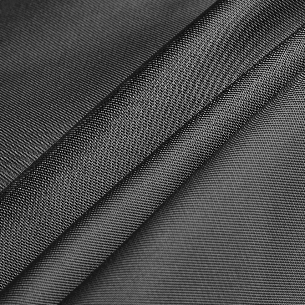 Close-up of black woven inner lining fabric showing matte smooth finish texture