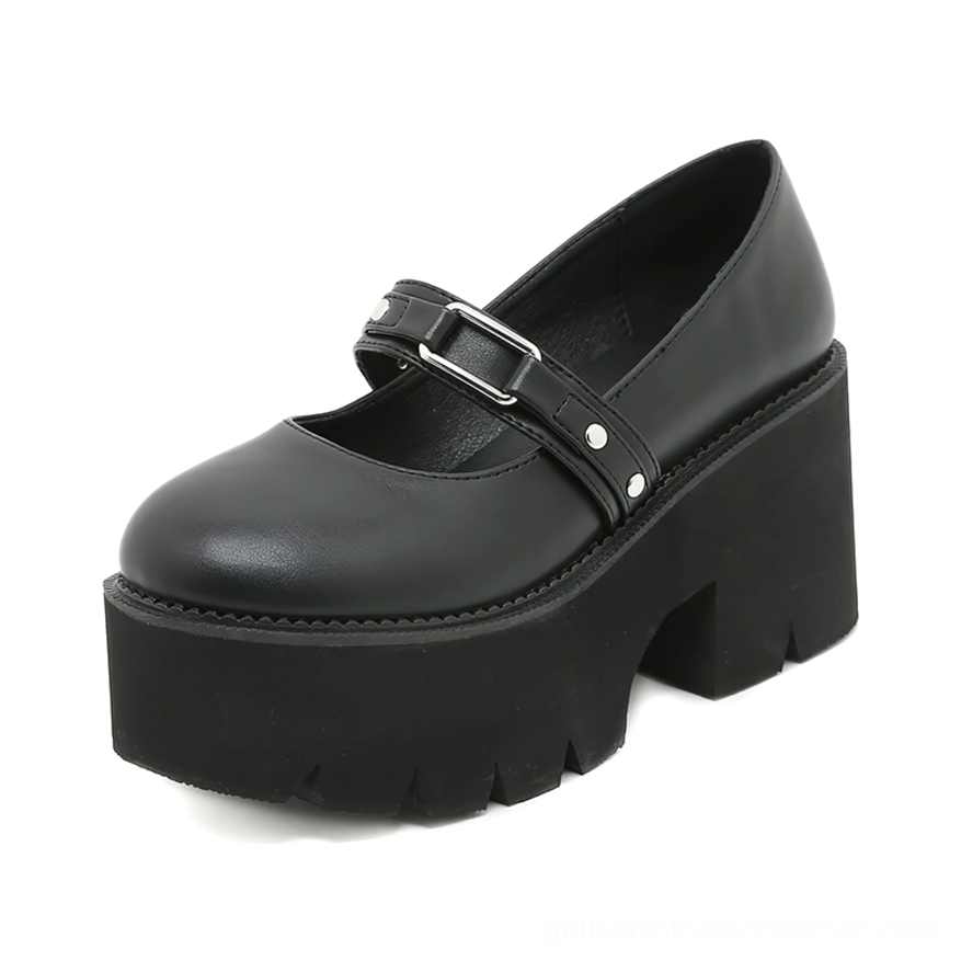 Single black Mary Jane shoe side profile displaying chunky block heel, substantial platform, and adjustable buckle strap detail