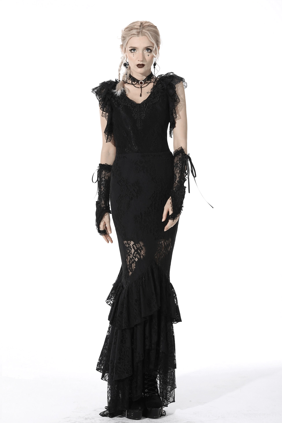 Black lace mermaid skirt detail shot of fitted waist, floral lace panels, and ruffle hem construction