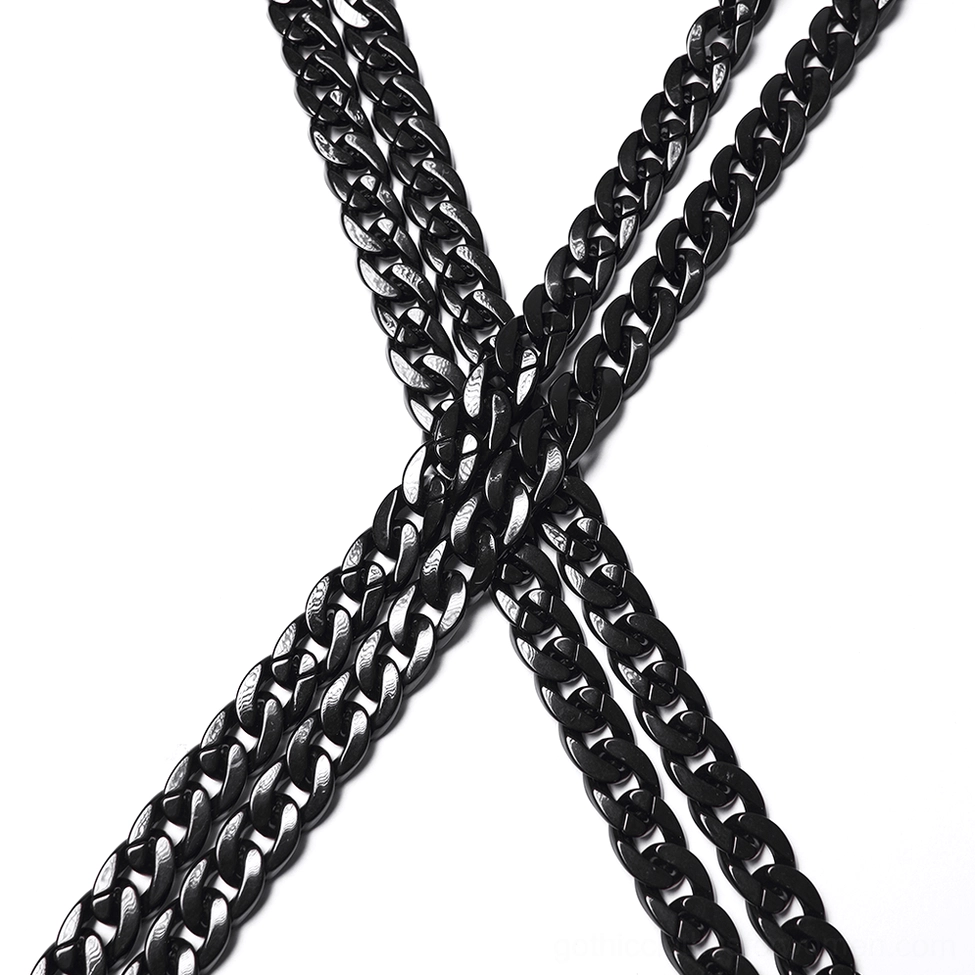 Black cropped mesh chain jacket with full metal epaulet harness system styled for gothic alternative fashion