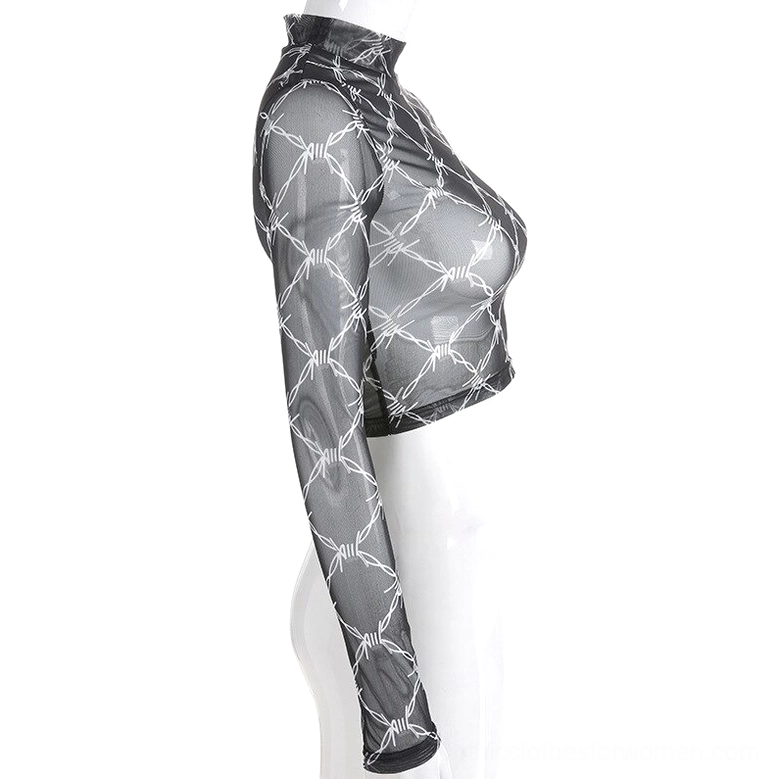Black mesh crop top side view on mannequin showing garment shape and barbed wire print pattern