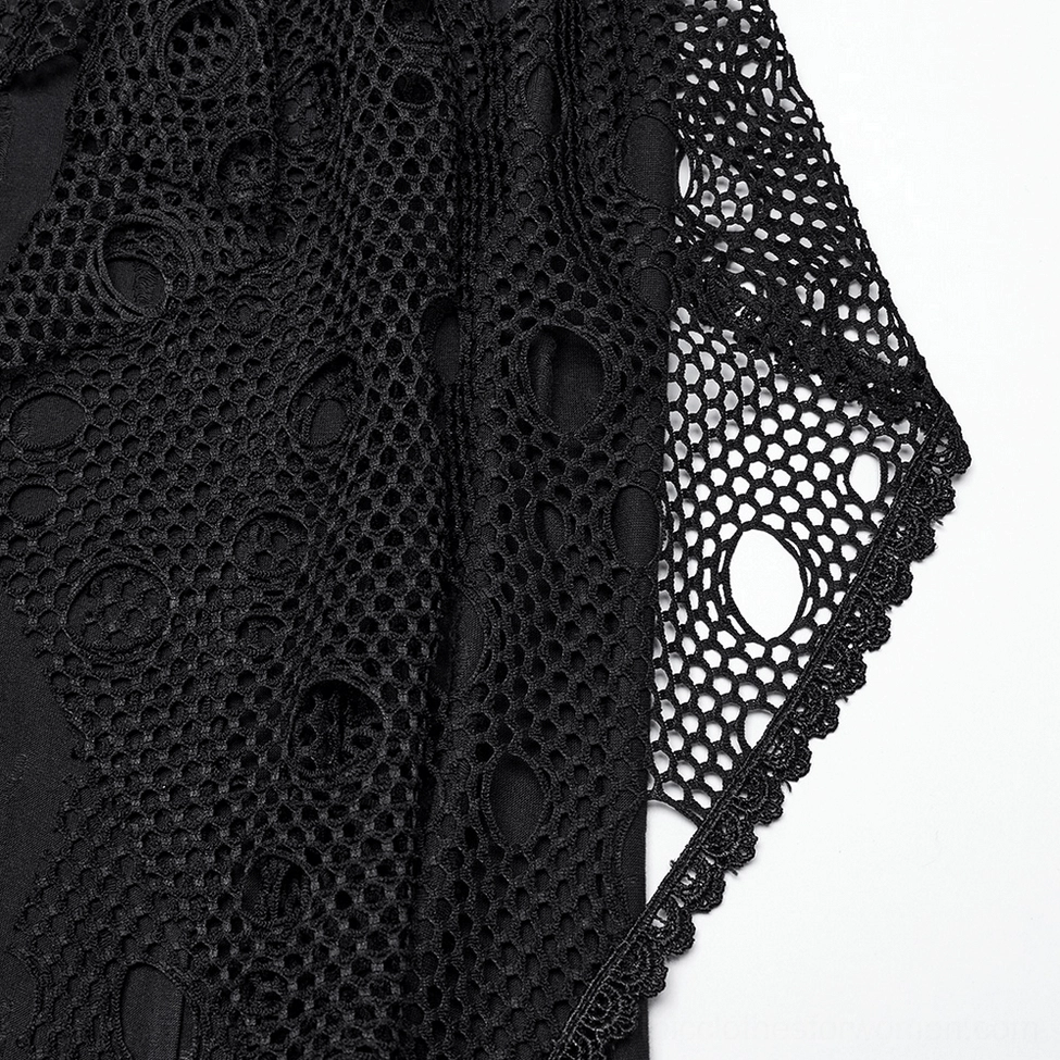 Close-up texture detail of hollow grid mesh with scalloped edge trim on gothic maxi skirt