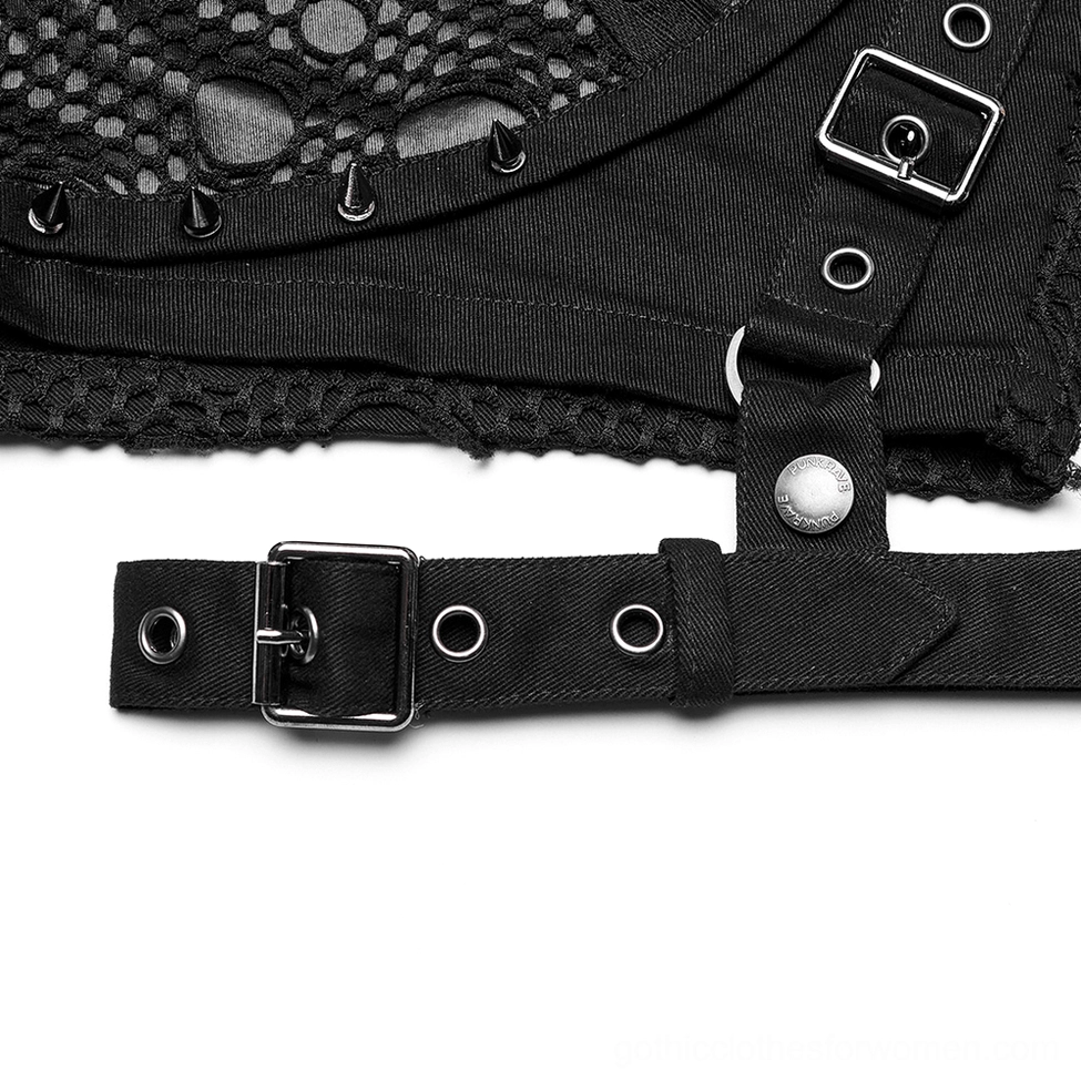 Black mesh garter shorts hardware close-up - buckle straps, metal eyelets, spike studs on black canvas fabric