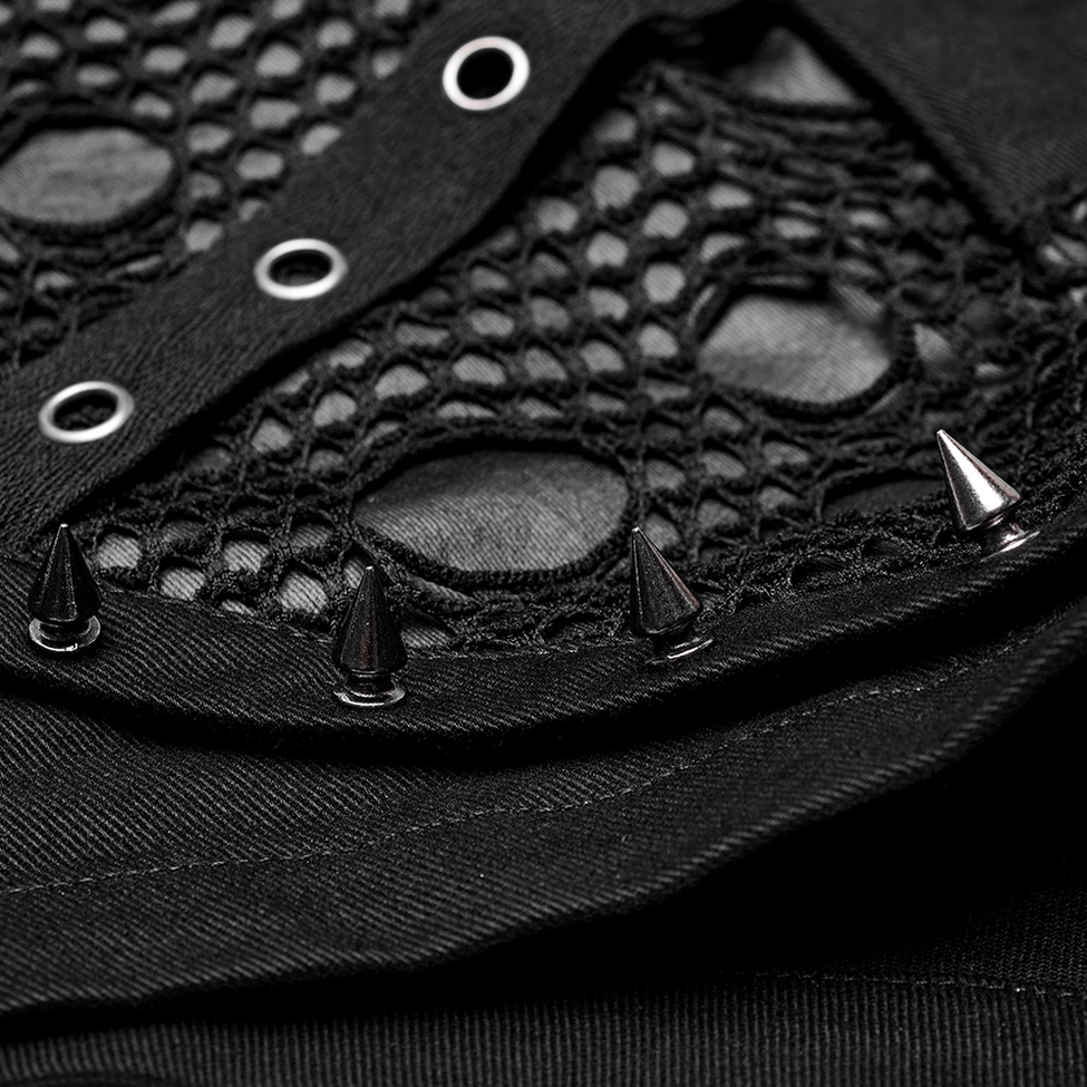 Black mesh garter shorts mesh and stud details - macro close-up of fishnet mesh texture with spike studs and circular metal eyelets