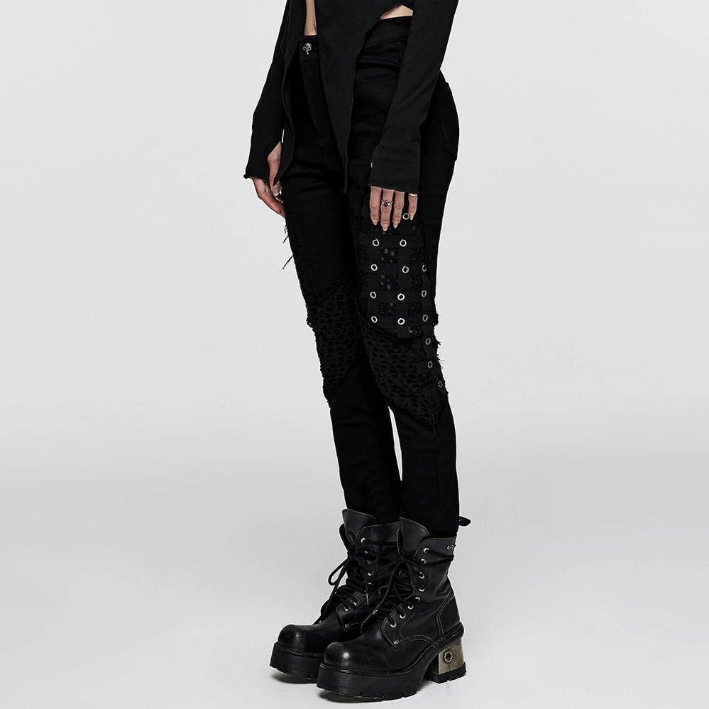 Black mesh grommet gothic skinny pants full length detail shot - industrial cage aesthetic