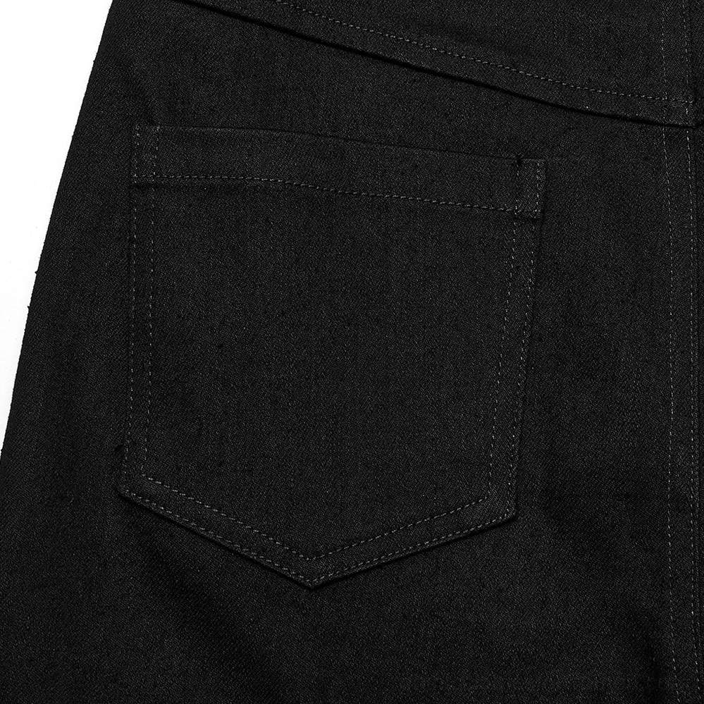 Close-up detail of stitched back pocket on black mesh grommet gothic skinny pants