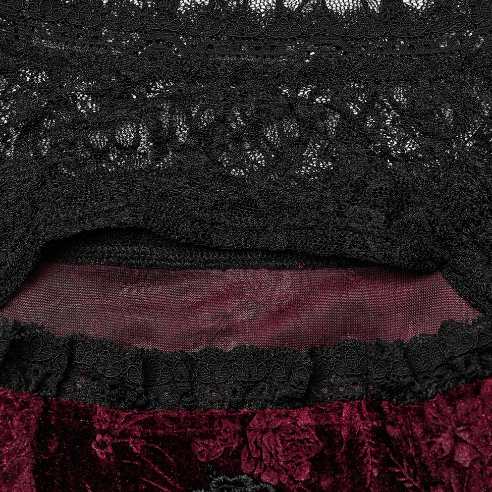Close-up detail of black ruffled mesh lace trim used on gothic rose velvet dress