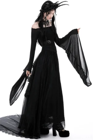 Black mesh off-shoulder gothic trumpet sleeve top three-quarter view with feathered dark headpiece and tulle skirt