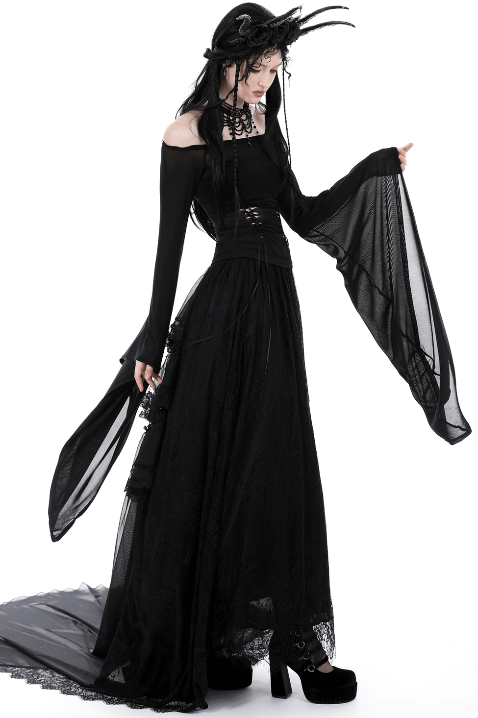 Black mesh off-shoulder gothic trumpet sleeve top three-quarter view with feathered dark headpiece and tulle skirt
