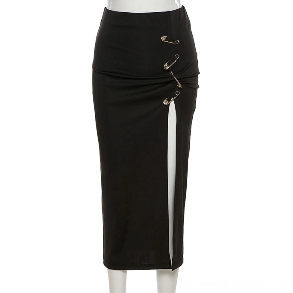 Black high-waist split midi skirt on mannequin showing multiple safety pin fasteners and side slit details