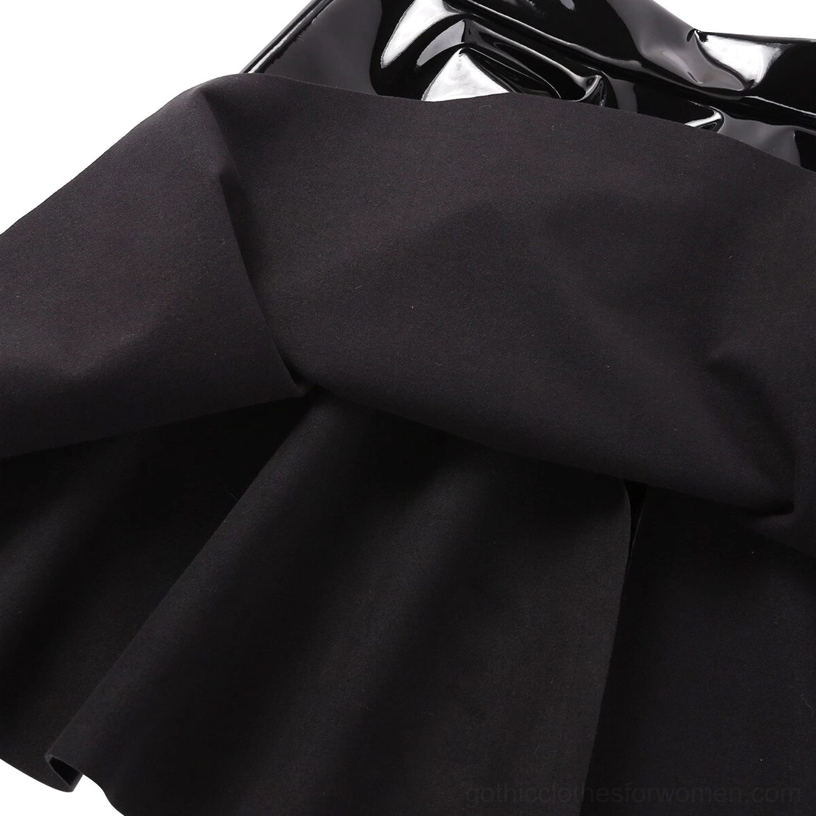 Black PU leather mini skirt inner lining detail, soft matte black fabric and folded skirt construction